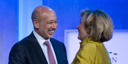 There Are Countless Pictures Of Hillary Clinton Apparently In Love With The Chair Of Goldman-Sachs (Left)